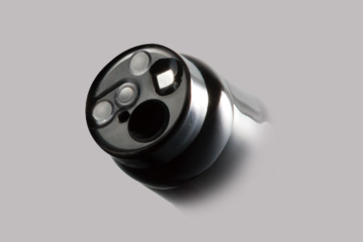 [photo] Distal end/tip of gastroscope, with functional parts