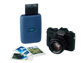 image of blue mini link printer, digital camera and pictures