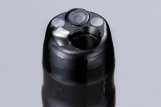 [photo] Distal end/tip of gastroscope, with functional parts