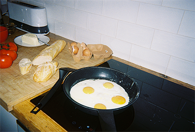 Photo of a fried egg taken with “QuickSnap™”