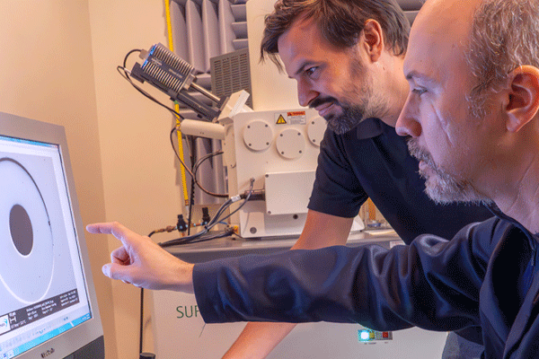 Members of the Fujifilm support team analyzing an issue