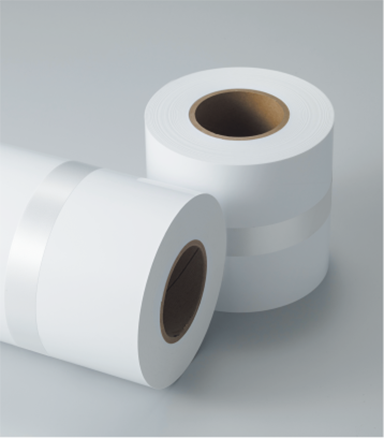 [photo] Two blank rolls of paper next to each other, one standing upright and other on its side