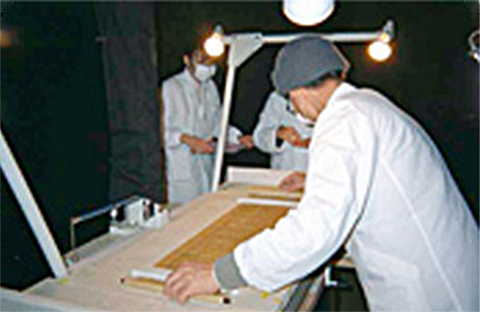 Documents placed on photography stand by Shosoin overseer
