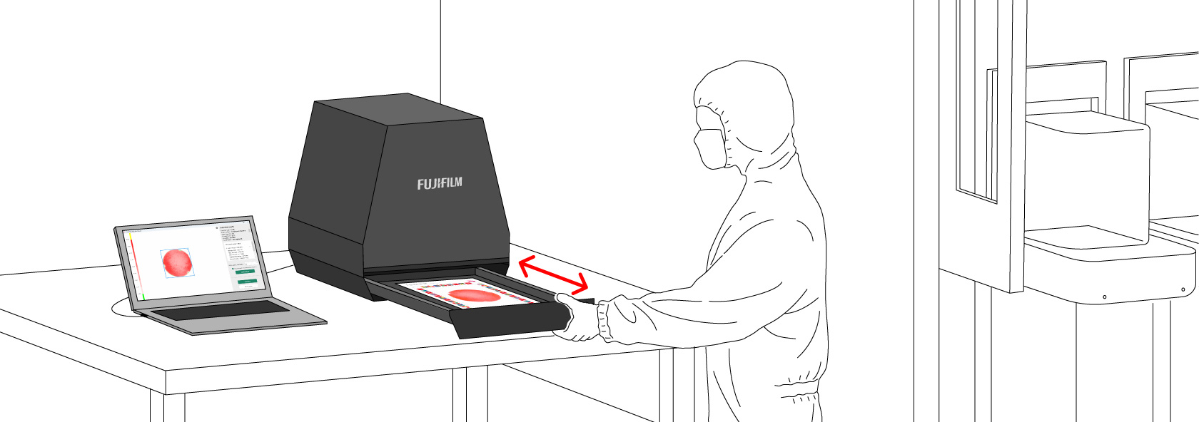 プレスケールステーションを操作する人
