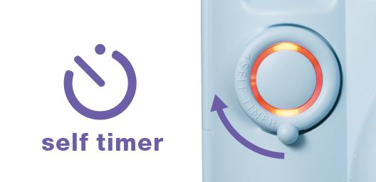 セルフタイマーレバーと点灯したセルフタイマーランプの画像