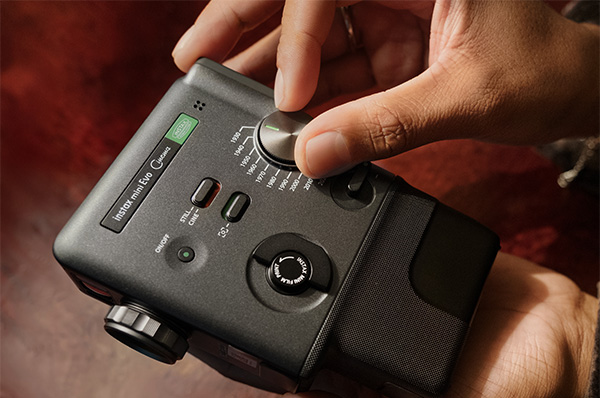 Using the dial on the instax mini Evo Cinema™