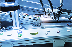 [photo] Variety of different elements of a lens on an assembly line