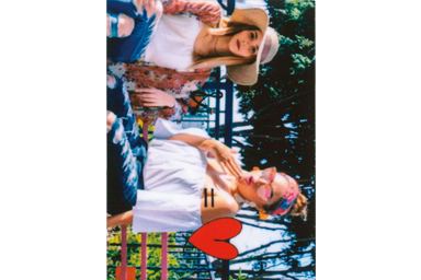 [photo] Heart frame applied to a sideways photo of 2 girls sitting at a park bench posing for the camera