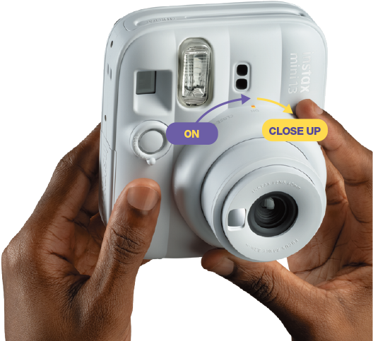 The Lens Ring being rotated to activate Close-up mode.