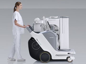 [photo] Healthcare professional pushing FDR Go Plus machine