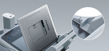 [photo] FPD cassette secured in holding channel on FDR Go PLUS system