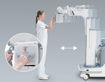 [photo] Healthcare professional in front of machine, able to move it forward and backward
