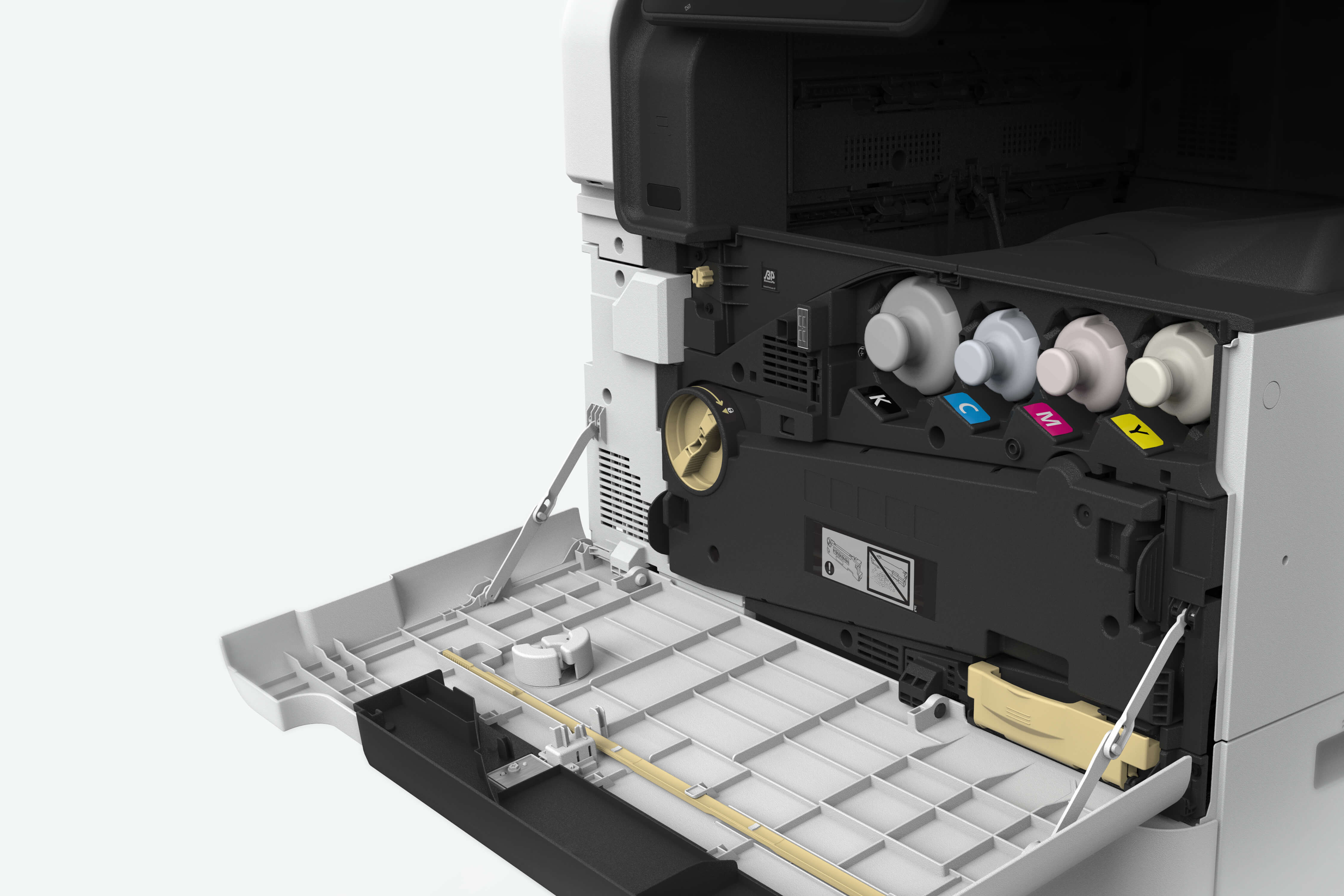 Inside a multifunction printer, with the cover open, revealing cyan, magenta, yellow, and black toner cartridges.