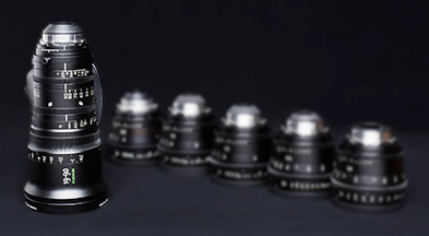 [photo] An tall ZX series lens with a collection of shorter ZK series lenses as a blurry background