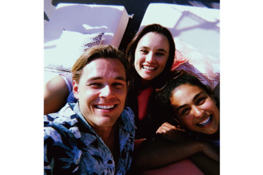 Image of three persons with Nostalgic filter applied