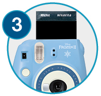 Zoomed in image showing instant photo shooting up - Step 3