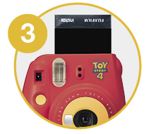 Zoomed in image showing instant photo shooting up - Step 3