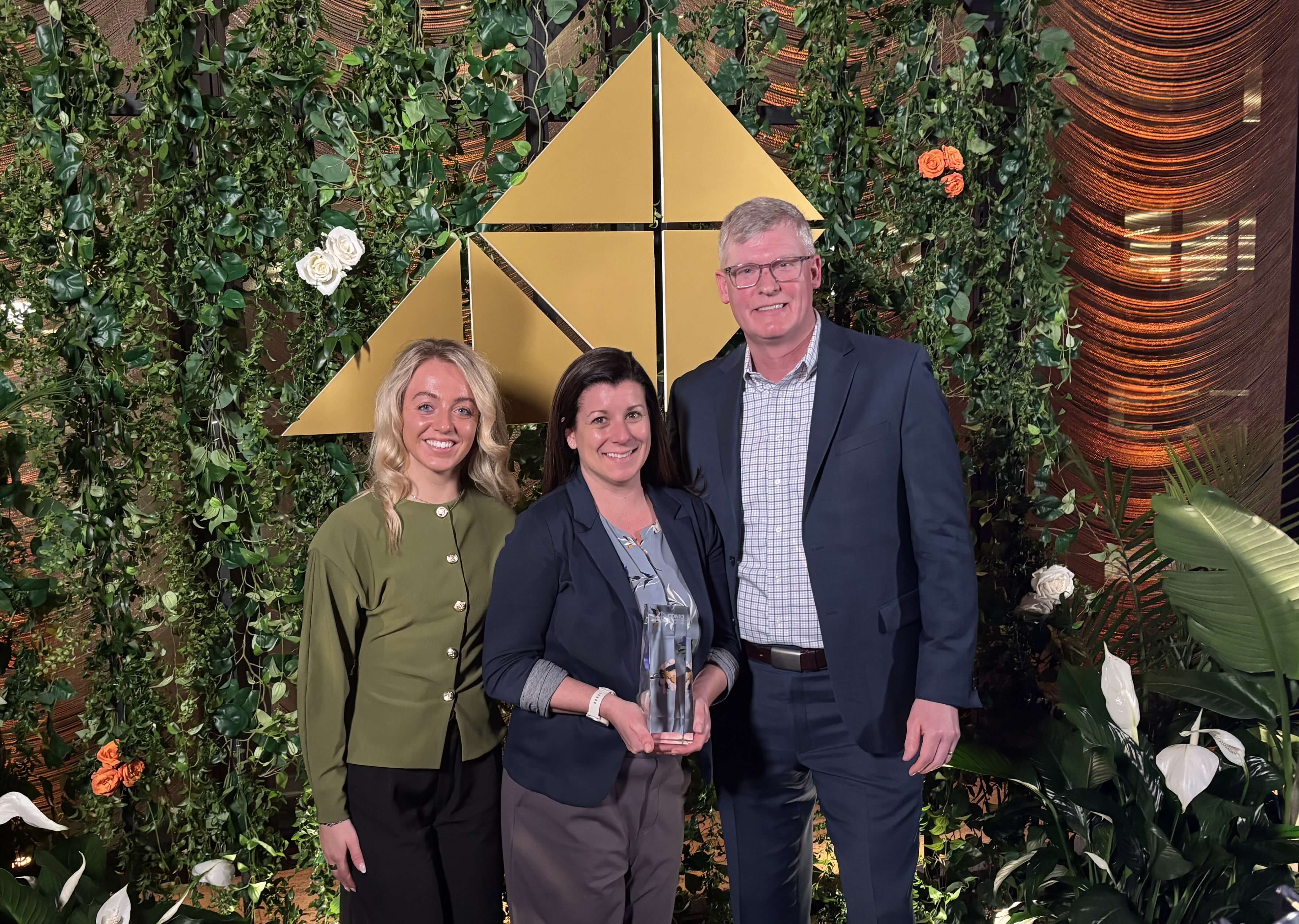 FUJIFILM Biotechnologies members pose together with the award