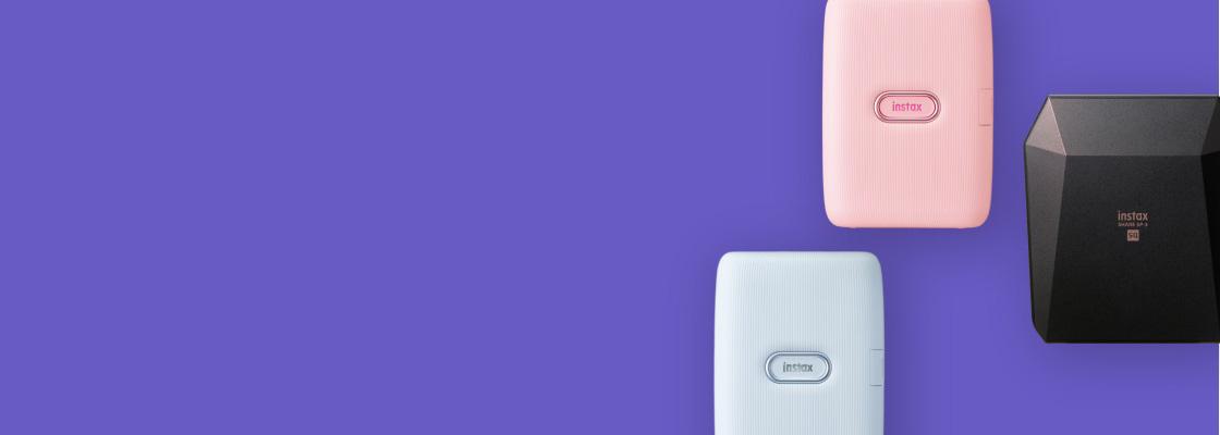 purple banner with three different printers