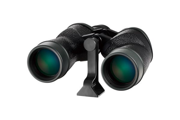 [photo] Binoculars with green lenses sitting on top of tripod adaptor accessory