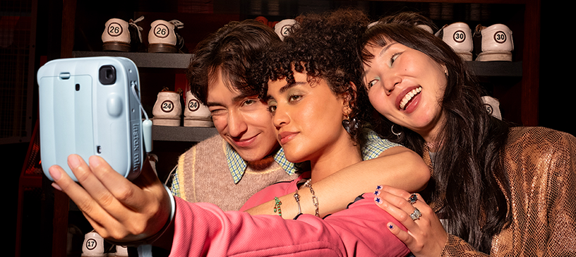 Image of people using instax mini 13™.