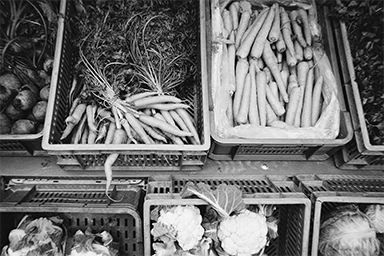 Overhead shot of vegetables on display at a market